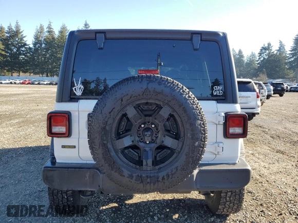 2022 Jeep Wrangler Unlimited Willys with VIN 1C4HJXDM4NW241859, listed as a Copart auction lot 42206205 with 31,449 mi miles and Salvage Title. Bid and sale history available at DreamBid. Image 6.
