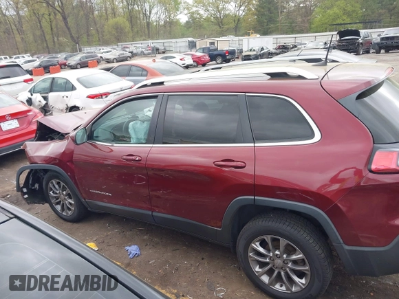 2019 Jeep Cherokee Latitude Plus with VIN 1C4PJLLB9KD434990, listed as a IAAI auction lot 41959477 with 96,283 mi miles and . Bid and sale history available at DreamBid. Image 14.