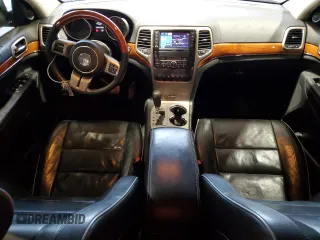 2013 Jeep Grand Cherokee Overland with VIN 1C4RJFCT5DC599866, listed as a Copart auction lot 51837395 with 105,521 mi miles and Salvage Title. Bid and sale history available at carsss.com. Image 8.