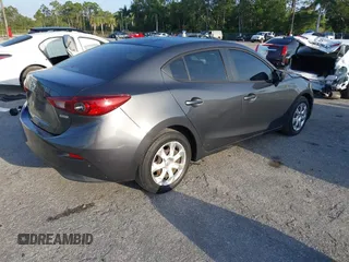 2016 Mazda 3 i Sport with VIN 3MZBM1T70GM305353, listed as a IAAI auction lot 42101846 with 103,791 mi miles and . Bid and sale history available at DreamBid. Image 4.