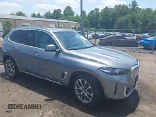 2024 BMW X5 xDrive50e with VIN 5UX43EU02R9V06615, listed as a IAAI auction lot 42557113 with 17,087 mi miles and . Bid and sale history available at DreamBid. Image 1.