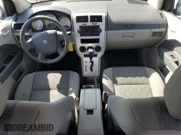 2007 Dodge Caliber SXT z VIN 1B3HB48B77D340860, wystawiony jako Copart lot #55637705 z przebiegiem 152 933 mil mil oraz Czysty tytuł • Clean title. Historia ofert i sprzedaży dostępna na DreamBid. Obrazek 8.