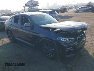 2019 BMW X4 M40i with VIN 5UXUJ5C54KLJ64077, listed as a IAAI auction lot 41012233 with 40,737 mi miles. Bid and sale history available at carsss.com. Image 1.