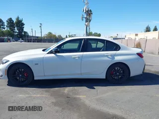 2023 BMW 3 Series 330e with VIN 3MW39FF02P8C89795, listed as a IAAI auction lot 41648172 with 27,179 mi miles. Bid and sale history available at carsss.com. Image 14.