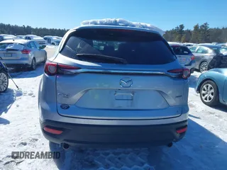 2016 Mazda CX-9 Sport with VIN JM3TCBBYXG0117878, listed as a IAAI auction lot 41617757 with 114,231 mi miles. Bid and sale history available at carsss.com. Image 16.