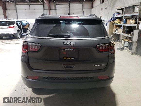 2020 Jeep Compass Sport с VIN 3C4NJCAB9LT144349, выставлен на аукционе Copart как лот 52350725 с пробегом 71 282 миль миль и Списание • Salvage title. История ставок и продаж доступна на DreamBid. Изображение 6.