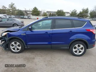 2013 Ford Escape SE z VIN 1FMCU9GX5DUD35239, wystawiony jako IAAI lot #41677245 z przebiegiem Nie podano mil oraz . Historia ofert i sprzedaży dostępna na DreamBid. Obrazek 14.