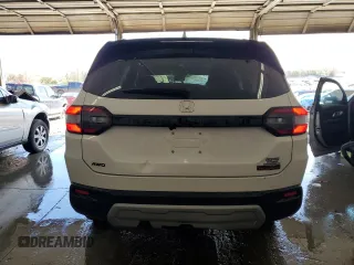 2025 Honda Pilot TrailSport z VIN 5FNYG1H67SB094346, wystawiony jako Copart lot #51415995 z przebiegiem 5 871 mil mil oraz Szkoda całkowita • Salvage title. Historia ofert i sprzedaży dostępna na DreamBid. Obrazek 6.