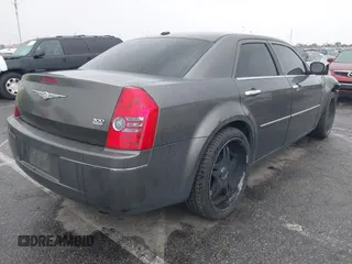 2010 Chrysler 300 Touring with VIN 2C3CA5CV2AH125842, listed as a IAAI auction lot 41804591 with 241,216 mi miles. Bid and sale history available at carsss.com. Image 4.