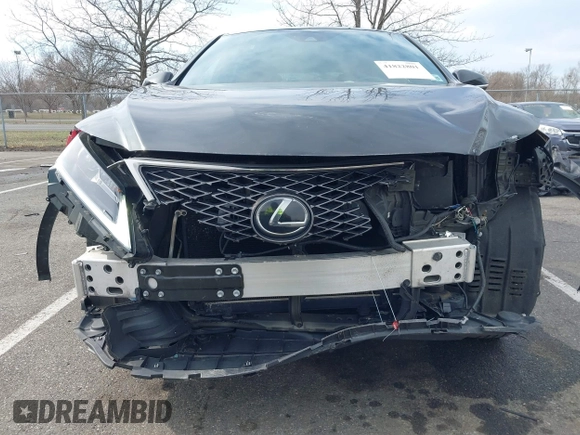 2020 Lexus RX with VIN 2T2SZMDA8LC256854, listed as a IAAI auction lot 41822801 with 74,814 mi miles. Bid and sale history available at carsss.com. Image 6.