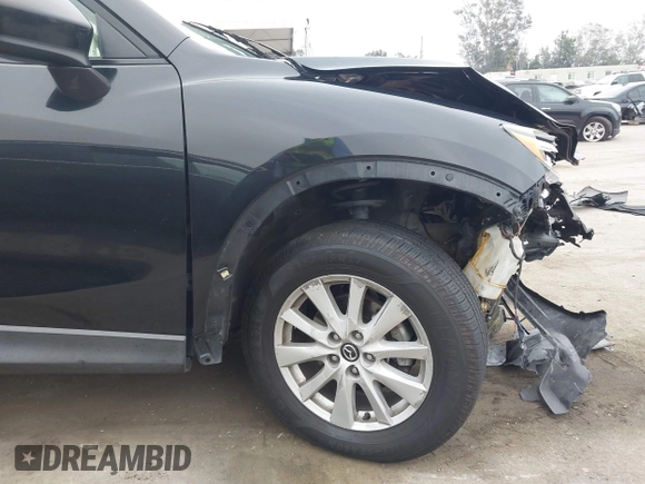 2014 Mazda CX-5 Touring z VIN JM3KE2CY3E0355332, wystawiony jako IAAI lot #42096306 z przebiegiem 108 198 mil mil oraz . Historia ofert i sprzedaży dostępna na DreamBid. Obrazek 19.