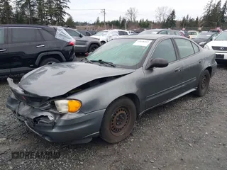 2004 Pontiac Grand Am SE with VIN 1G2NE52F94M530881, listed as a IAAI auction lot 41648302 with 116,540 mi miles. Bid and sale history available at carsss.com. Image 2.