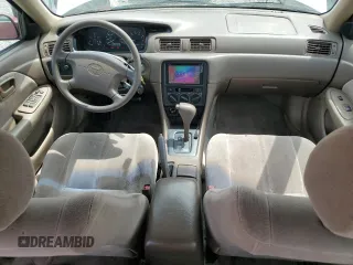 1999 Toyota Camry LE z VIN JT2BF22K8X0181675, wystawiony jako Copart lot #55057875 z przebiegiem 184 657 mil mil oraz Szkoda całkowita • Salvage title. Historia ofert i sprzedaży dostępna na DreamBid. Obrazek 8.