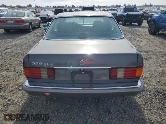 1990 Mercedes-Benz 560 with VIN WDBCA39E3LA553622, listed as a Copart auction lot 81530904 with 142,614 mi miles and Clean Title. Bid and sale history available at DreamBid. Image 6.