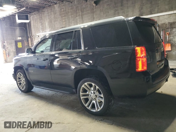 2018 Chevrolet Tahoe LT with VIN 1GNSKBKC7JR361008, listed as a Copart auction lot 55244355 with 76,850 mi miles and Salvage title. Bid and sale history available at DreamBid. Image 2.