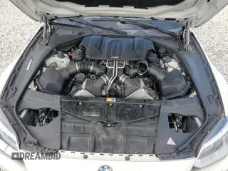 2014 BMW M6 z VIN WBSLX9C51ED160143, wystawiony jako Copart lot #73044214 z przebiegiem 91 717 mil mil oraz Szkoda całkowita • Salvage title. Historia ofert i sprzedaży dostępna na DreamBid. Obrazek 11.
