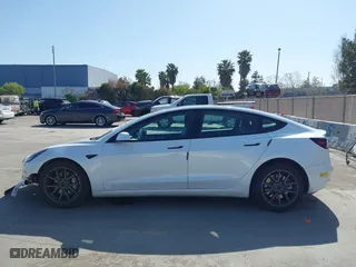 2022 Tesla Model 3 Long Range with VIN 5YJ3E1EB3NF179304, listed as a IAAI auction lot 42003380 with 46,759 mi miles. Bid and sale history available at carsss.com. Image 14.