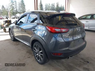 2017 Mazda CX-3 Grand Touring z VIN JM1DKFD70H0150496, wystawiony jako IAAI lot #41746038 z przebiegiem 108 091 mil mil oraz . Historia ofert i sprzedaży dostępna na DreamBid. Obrazek 3.