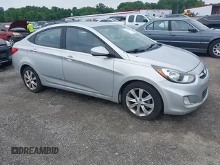 2013 Hyundai Accent GLS with VIN KMHCU4AEXDU451403, listed as a IAAI auction lot 42719237 with 144,056 mi miles and . Bid and sale history available at DreamBid. Image 1.