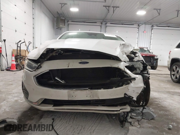 2019 Ford Fusion Hybrid SEL with VIN 3FA6P0MU8KR272811, listed as a IAAI auction lot 41705282 with 56,565 mi miles. Bid and sale history available at carsss.com. Image 12.