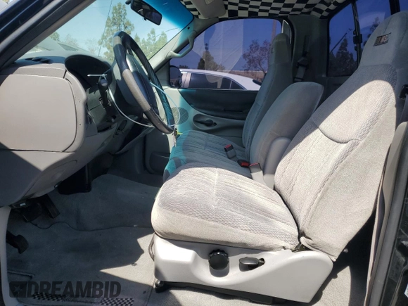 1998 Ford F-150 with VIN 1FTYF1764WNC18357, listed as a Copart auction lot 62138625 with 144,879 mi miles and Salvage title. Bid and sale history available at DreamBid. Image 7.