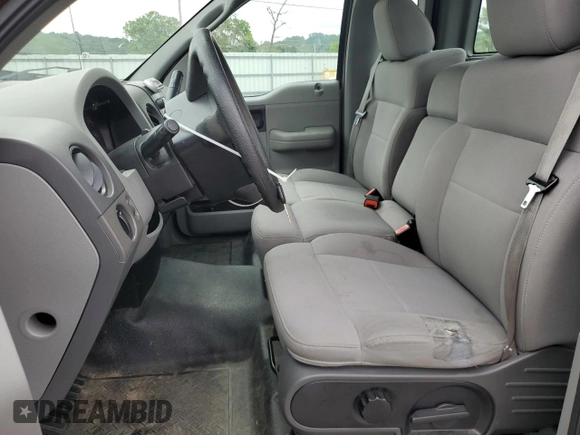 2006 Ford F-150 XL with VIN 1FTRF12276NB28418, listed as a Copart auction lot 58715645 with 161,447 mi miles and Salvage title. Bid and sale history available at DreamBid. Image 7.