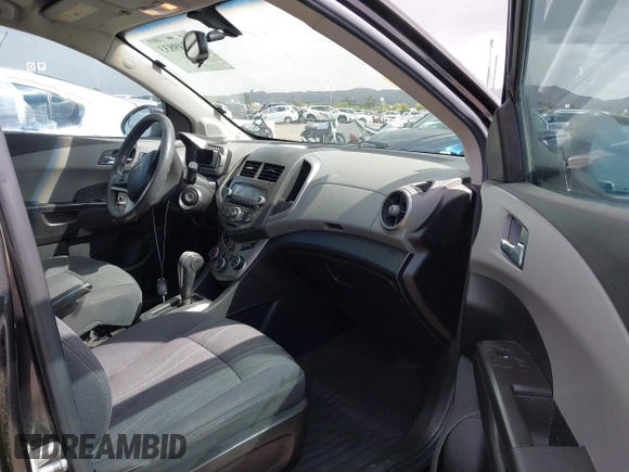 2014 Chevrolet Sonic LT with VIN 1G1JC6SHXE4135948, listed as a IAAI auction lot 41949833 with 127,202 mi miles. Bid and sale history available at carsss.com. Image 5.