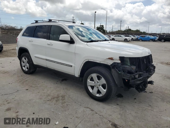 2013 Jeep Grand Cherokee Laredo with VIN 1C4RJEAG4DC517044, listed as a Copart auction lot 51250875 with 150,388 mi miles and Salvage Title. Bid and sale history available at carsss.com. Image 4.