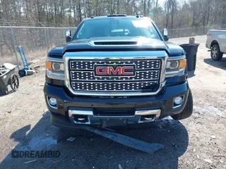 2019 GMC Sierra 2500HD Denali with VIN 1GT12SEY3KF207121, listed as a IAAI auction lot 38782753 with 87,337 mi miles. Bid and sale history available at carsss.com. Image 13.