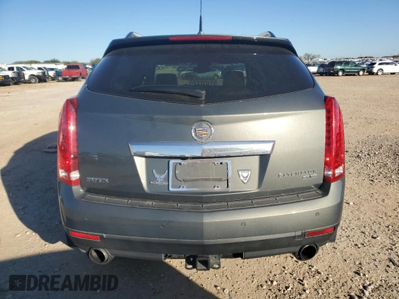 2013 Cadillac SRX Premium Collection z VIN 3GYFNEE35DS605779, wystawiony jako Copart lot #84451744 z przebiegiem 60 339 mil mil oraz Czysty tytuł • Clean title. Historia ofert i sprzedaży dostępna na DreamBid. Obrazek 6.