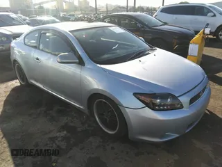 2006 Scion tC with VIN JTKDE167860066097, listed as a IAAI auction lot 38613758 with 216,821 mi miles. Bid and sale history available at carsss.com. Image 1.