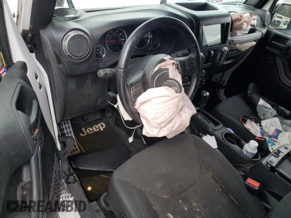 2018 Jeep Wrangler Unlimited Sport S with VIN 1C4BJWDGXJL849522, listed as a Copart auction lot 48964995 with 104,910 mi miles and Salvage title. Bid and sale history available at DreamBid. Image 8.