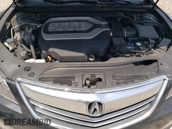 2014 Acura RLX Technology с VIN JH4KC1F53EC000121, выставлен на аукционе Copart как лот 62148785 с пробегом 140 526 миль миль и Списание • Salvage title. История ставок и продаж доступна на DreamBid. Изображение 11.