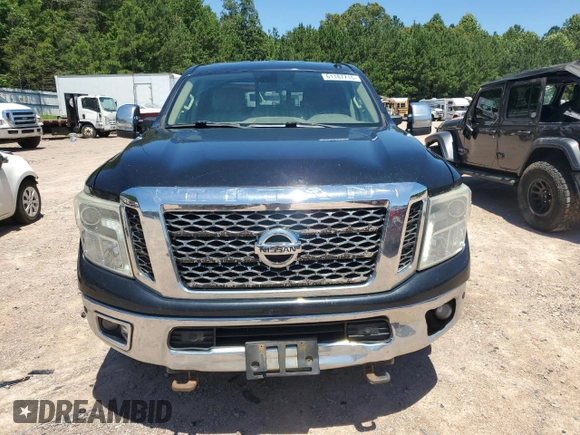 2016 Nissan Titan Platinum Reserve with VIN 1N6BA1F48GN513710, listed as a Copart auction lot 61187715 with 291,548 mi miles and Clean title. Bid and sale history available at DreamBid. Image 5.