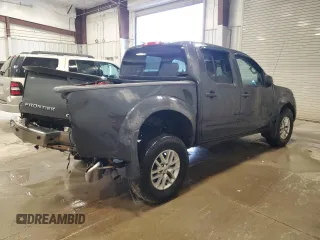 2015 Nissan Frontier Pro-4X with VIN 1N6AD0EV8FN703027, listed as a Copart auction lot 55217005 with 175,794 mi miles and Salvage title. Bid and sale history available at DreamBid. Image 3.