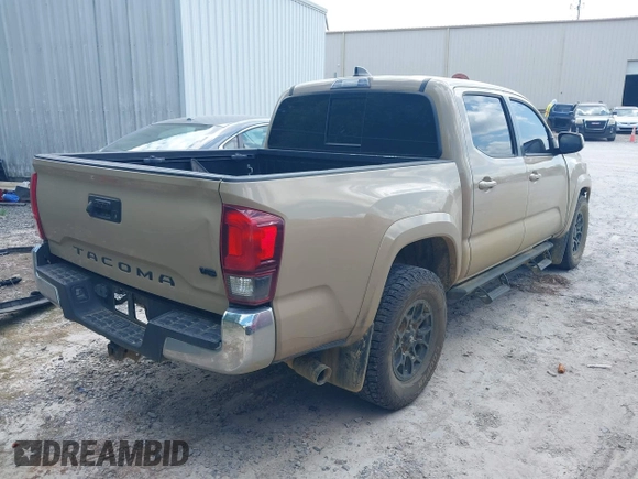 2020 Toyota Tacoma SR5 with VIN 3TMAZ5CN5LM123521, listed as a IAAI auction lot 42144925 with Not provided miles and . Bid and sale history available at DreamBid. Image 4.