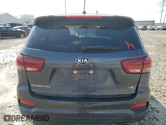 2019 Kia Sorento LX z VIN 5XYPG4A57KG486900, wystawiony jako Copart lot #52674115 z przebiegiem 105 259 mil mil oraz Szkoda całkowita • Salvage title. Historia ofert i sprzedaży dostępna na DreamBid. Obrazek 6.