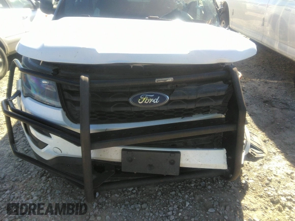 2017 Ford Police Interceptor Utility z VIN 1FM5K8AR8HGB08036, wystawiony jako IAAI lot #41015812 z przebiegiem 18 153 mil mil oraz . Historia ofert i sprzedaży dostępna na DreamBid. Obrazek 12.