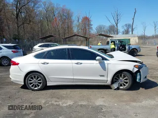 2018 Ford Fusion Energi SE with VIN 3FA6P0PU9JR105934, listed as a IAAI auction lot 41935227 with 149,863 mi miles. Bid and sale history available at carsss.com. Image 13.