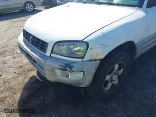 1998 Toyota RAV4 with VIN JT3GP10V9W7038486, listed as a IAAI auction lot 41778465 with 157,143 mi miles. Bid and sale history available at carsss.com. Image 6.