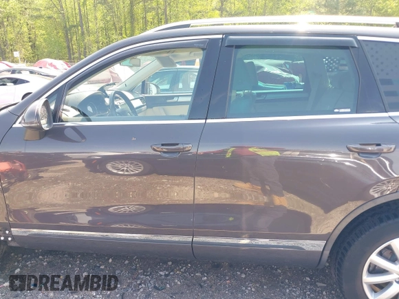 2012 Volkswagen Touareg Sport z VIN WVGEF9BPXCD011020, wystawiony jako IAAI lot #42000763 z przebiegiem 143 470 mil mil oraz . Historia ofert i sprzedaży dostępna na DreamBid. Obrazek 15.
