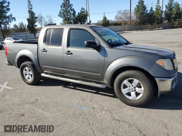 2009 Nissan Frontier SE with VIN 1N6AD07U49C405420, listed as a Copart auction lot 41983545 with 203,700 mi miles and Salvage title. Bid and sale history available at DreamBid. Image 4.