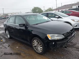 2011 Volkswagen Jetta SEL z VIN 3VWLX7AJ8BM348523, wystawiony jako IAAI lot #42336459 z przebiegiem 178 770 mil mil oraz . Historia ofert i sprzedaży dostępna na DreamBid. Obrazek 1.