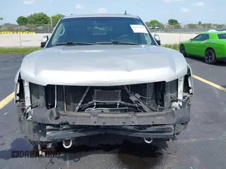 2013 Chevrolet Suburban LT with VIN 1GNSCJE08DR378459, listed as a IAAI auction lot 42453650 with 179,156 mi miles and . Bid and sale history available at DreamBid. Image 6.