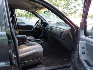 2001 Jeep Grand Cherokee Laredo with VIN 1J4GW48SX1C585867, listed as a IAAI auction lot 42793657 with 197,167 mi miles and . Bid and sale history available at DreamBid. Image 5.