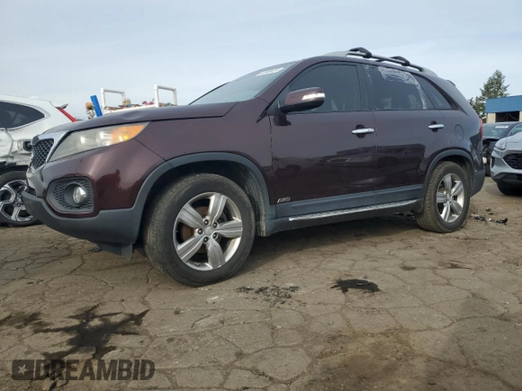 2012 Kia Sorento EX with VIN 5XYKUDA21CG201442, listed as a Copart auction lot 80690424 with 103,040 mi miles and Salvage Title. Bid and sale history available at carsss.com. Image 1.
