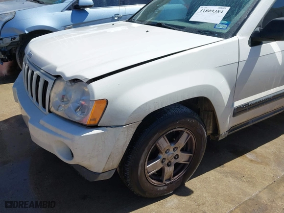 2007 Jeep Grand Cherokee Laredo with VIN 1J8HS48P37C658550, listed as a IAAI auction lot 41809384 with 1 mi miles. Bid and sale history available at carsss.com. Image 12.