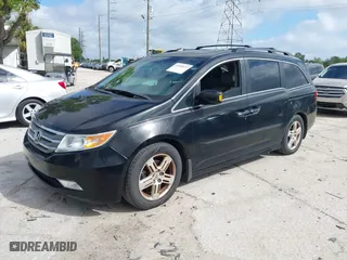 2013 Honda Odyssey Touring with VIN 5FNRL5H92DB003200, listed as a IAAI auction lot 41920237 with 167,483 mi miles. Bid and sale history available at carsss.com. Image 17.