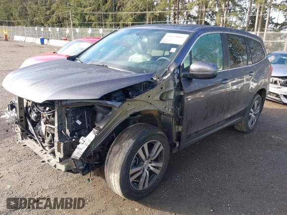 2017 Honda Pilot EX-L with VIN 5FNYF6H5XHB059834, listed as a IAAI auction lot 41670003 with 58,285 mi miles and . Bid and sale history available at DreamBid. Image 18.