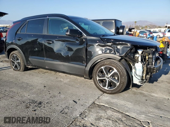 2023 Kia Niro EX with VIN KNDCR3LE9P5076681, listed as a Copart auction lot 42522465 with 56,896 mi miles and Salvage Title. Bid and sale history available at carsss.com. Image 4.